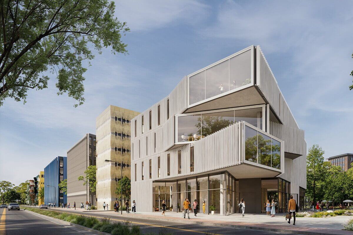 Markantes Fassadendesign mit Vor- und Rücksprüngen von GRAFT: Die STATION A – The Grand Entrance eröffnet den Funkytown Campus in Richtung Nordosten.